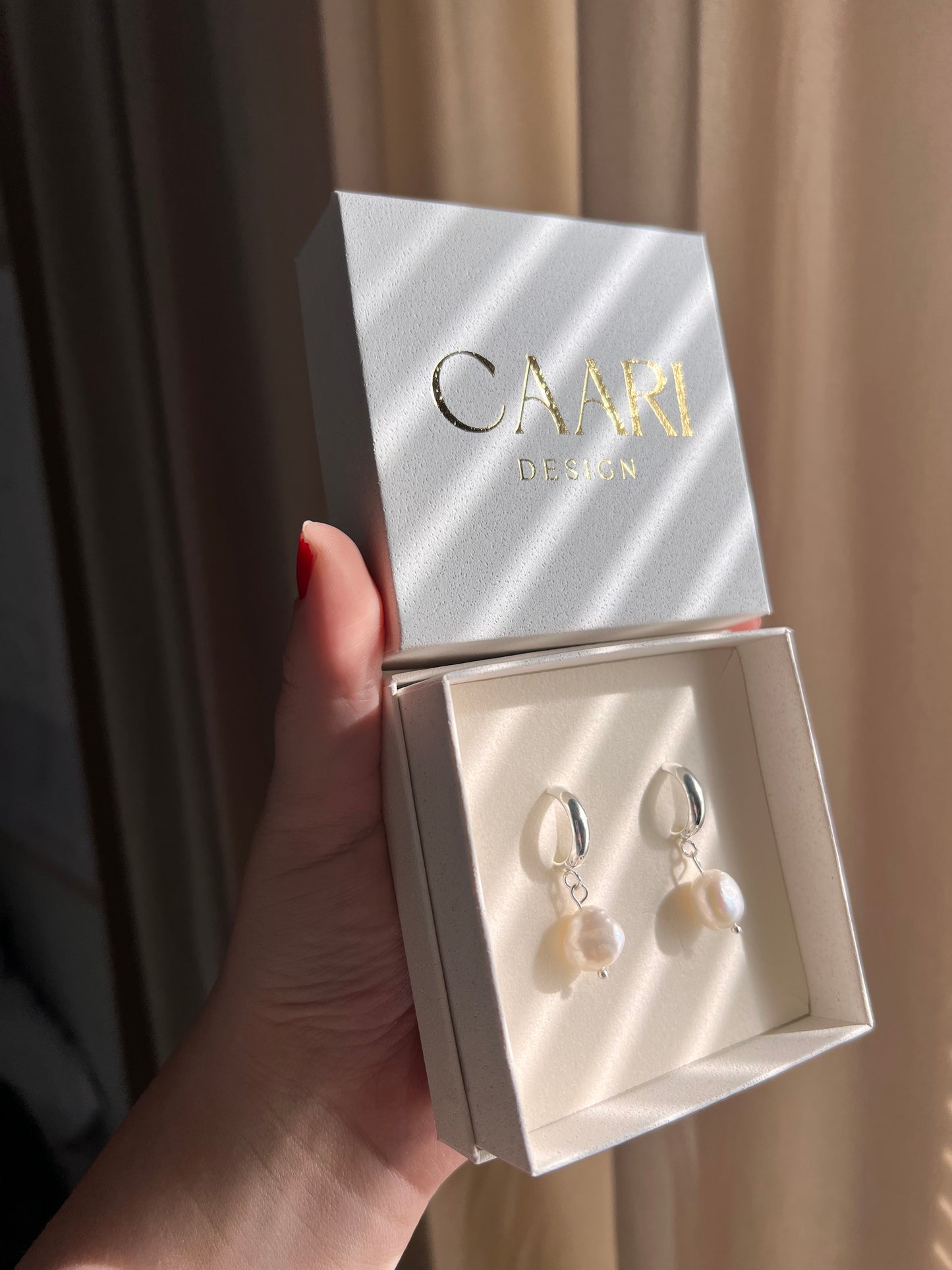 Örhängen med Nette-pärla