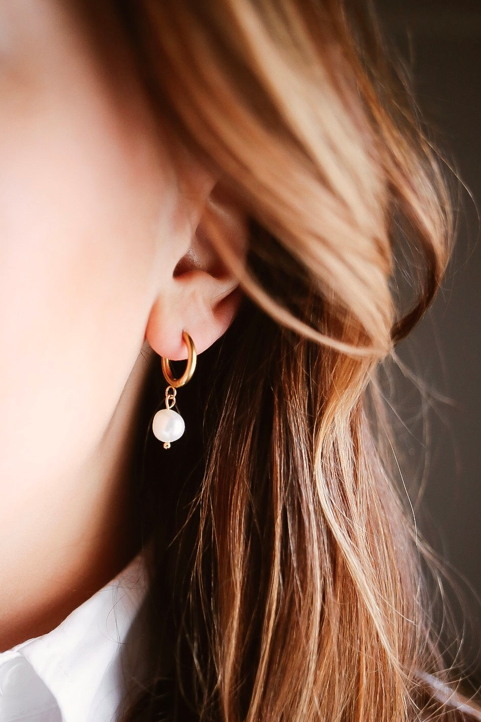 Lovis örhängen i kirurgiskt stål