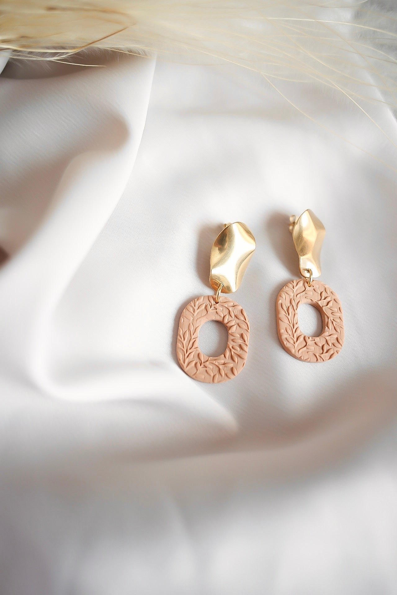 Sally korvakorut Kukkakuvio