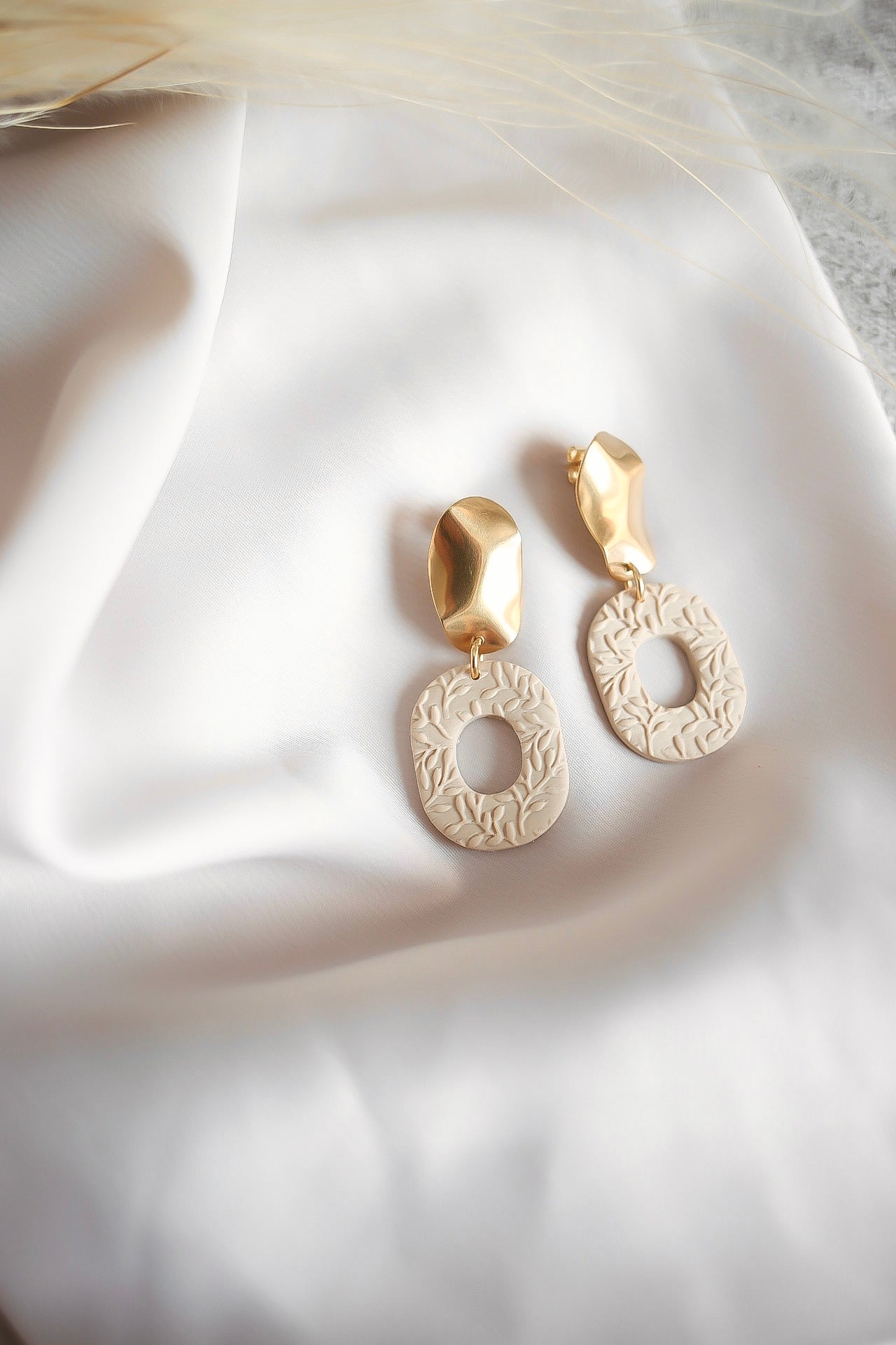 Sally korvakorut Kukkakuvio