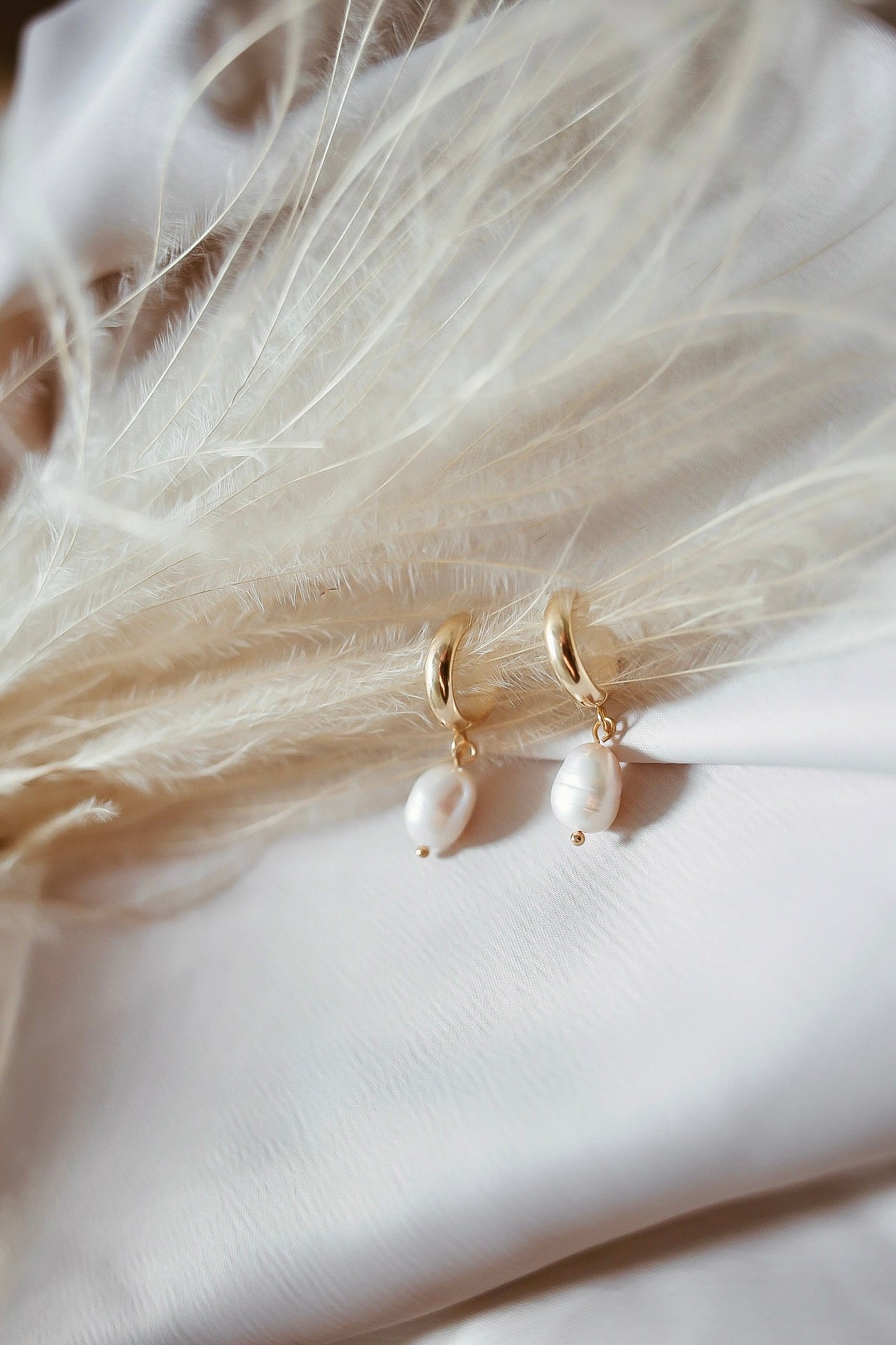 Nette helmikorvakorut